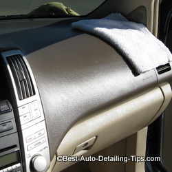 dashboard of a Lexus showing glossy effect of car interior dressing